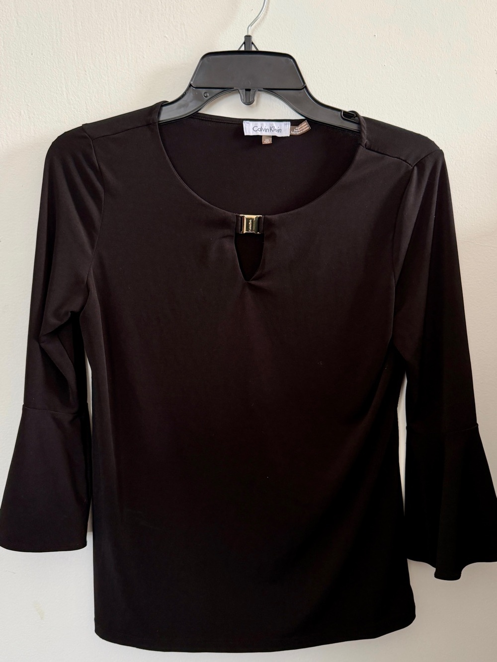 Calvin Klein Black Long Sleeve Top with Gold Accent